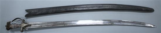 An Indian sword tulwar, silver decorated iron Lahori hilt, blade with etched inscription, 18th century, leather covered scabbard,